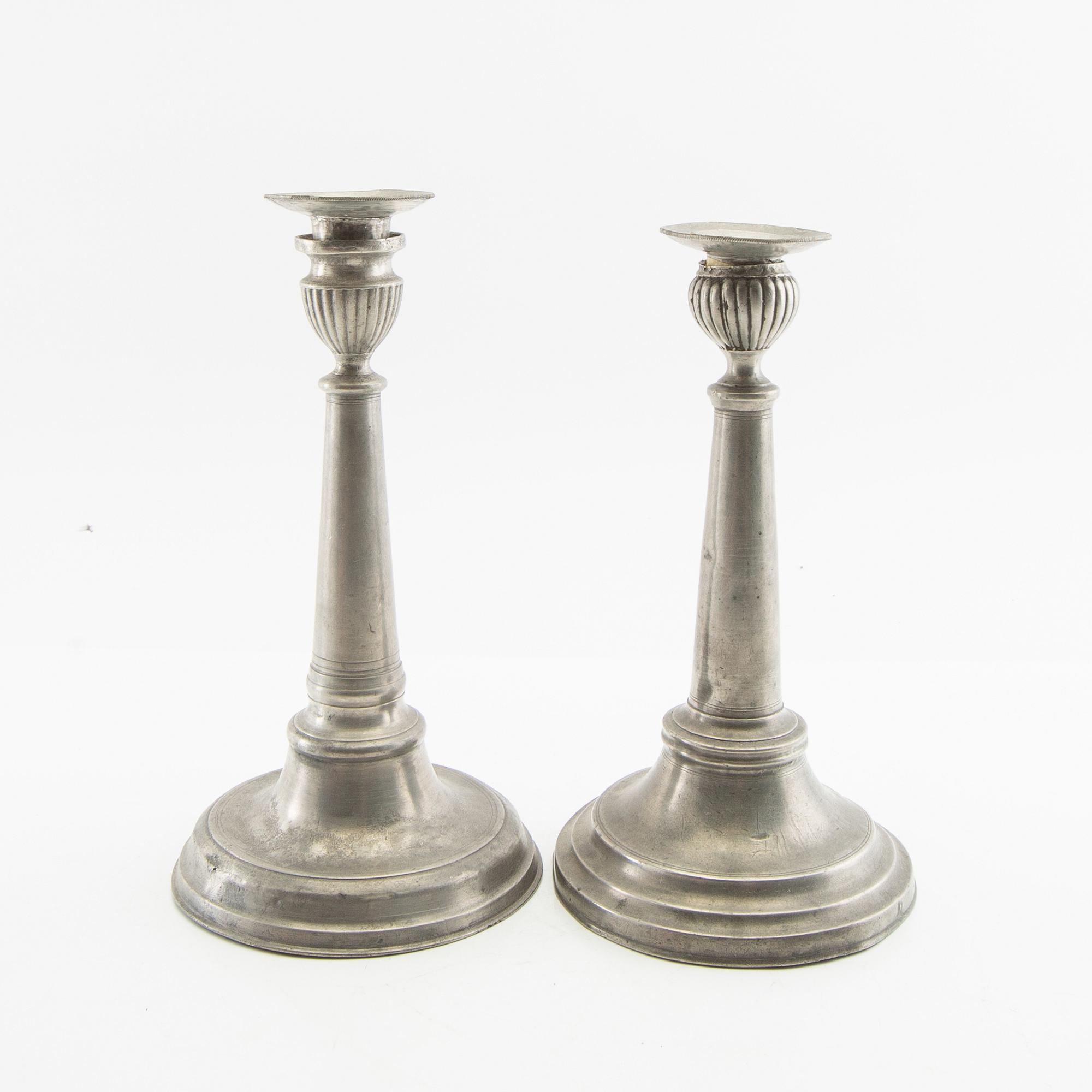 Candle holders, two pieces of pewter, 1850s.