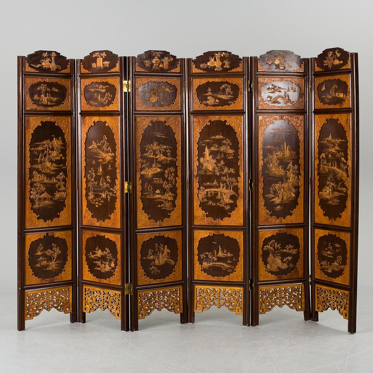A chinese 20th century six-panel relief wood screen.