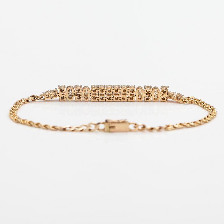 A 14K gold bracelet with diamonds ca. 1.50 ct in total.