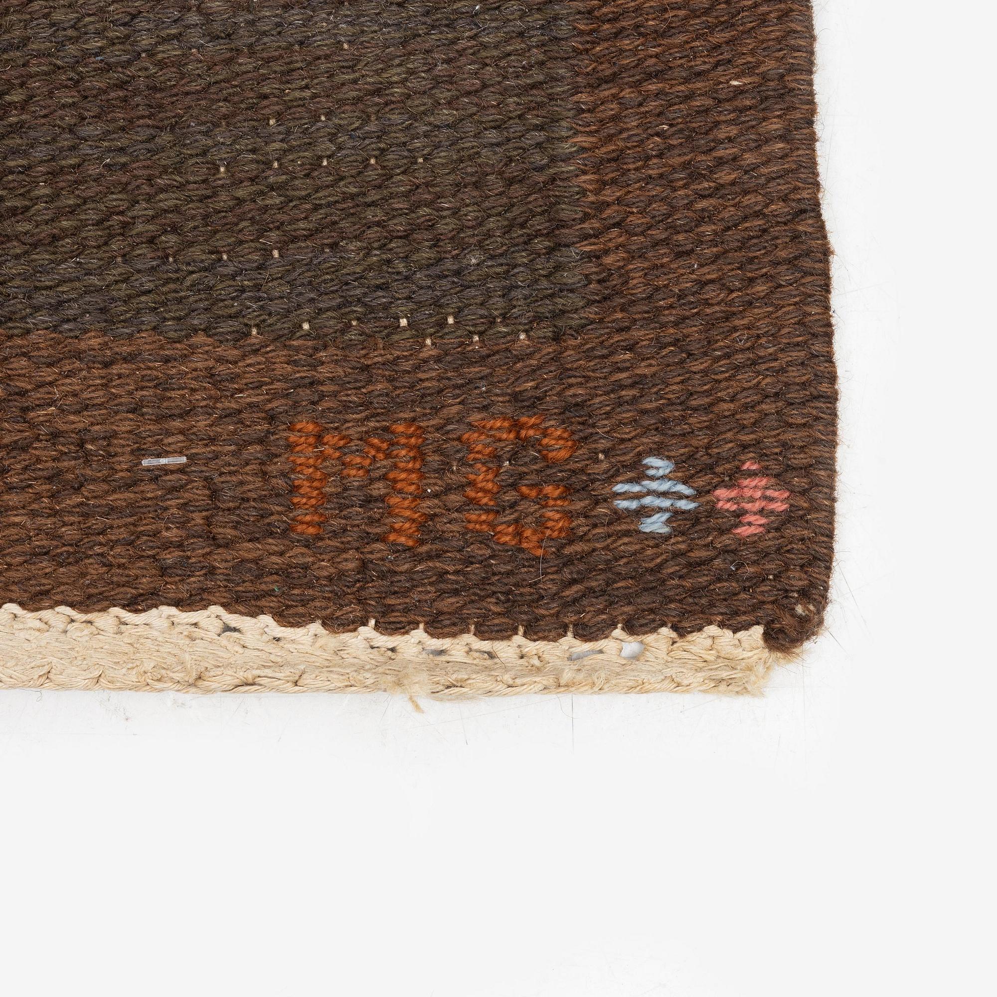 Margareta Grandin-Nettles, a flat weave 'Smaragd' carpet, c. 302 x 203 cm, signed GLH MG.
