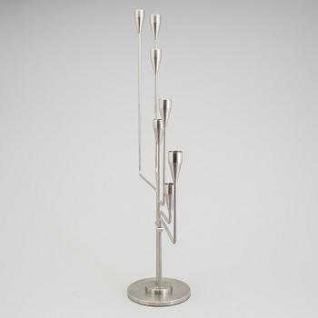 PIET HEIN, a stainless steel candelabrum, 21st Century.