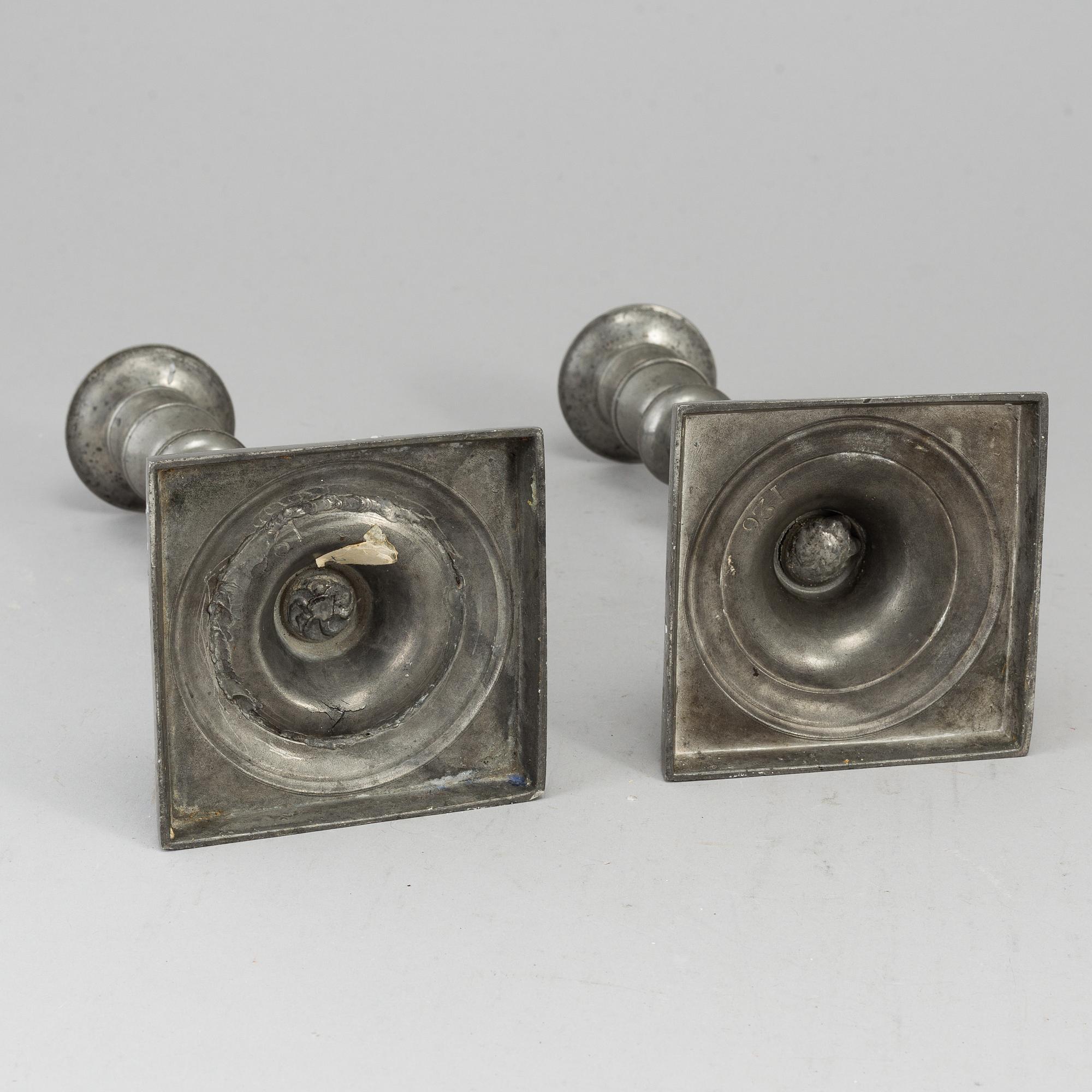 A pair of empire pewter candlesticks, first half of the 19th century.