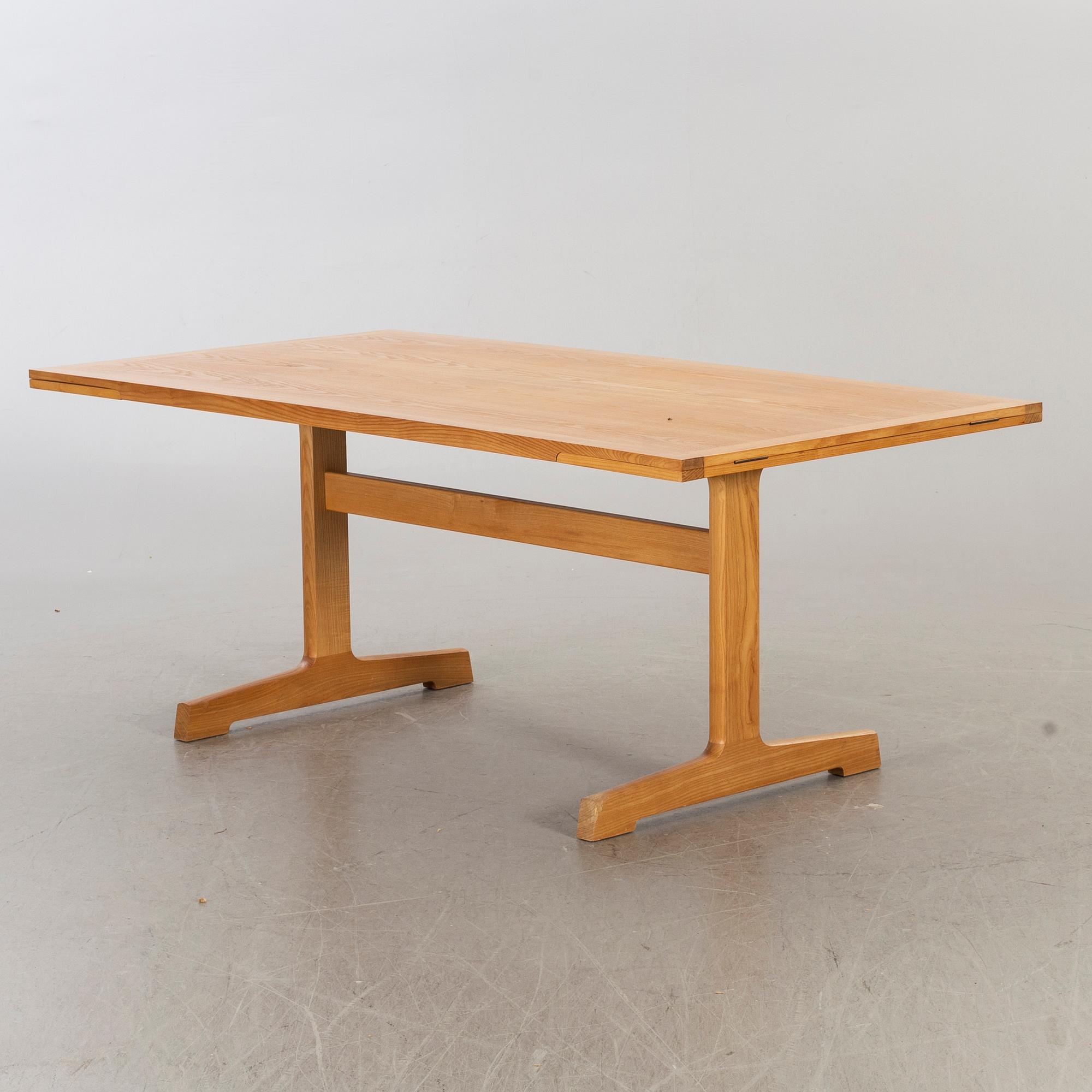 A late 20th century “Spisestue 594”, Ditte & Adrian Heath, France & Son dining table with 6 chairs.