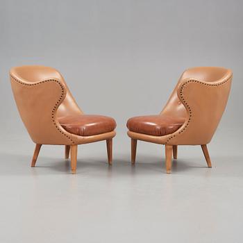 Arne Norell, A pair of Arne Norell 'Tummen/ The Thumb' easy chairs, Gösta Westerbergs Möbler, Stockholm 1950's.