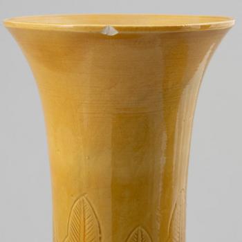 Two Chinese yellow glazed ceramic vases, 20th century.