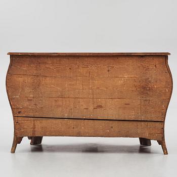 A brass-mounted and marquetry rococo commode, later part of the 18th century.