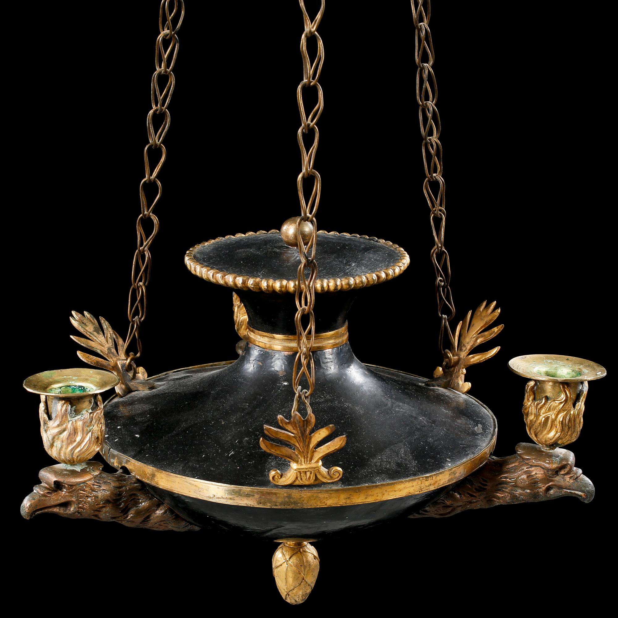 An empire three-branch chandelier, made in the first half of the 19th century.