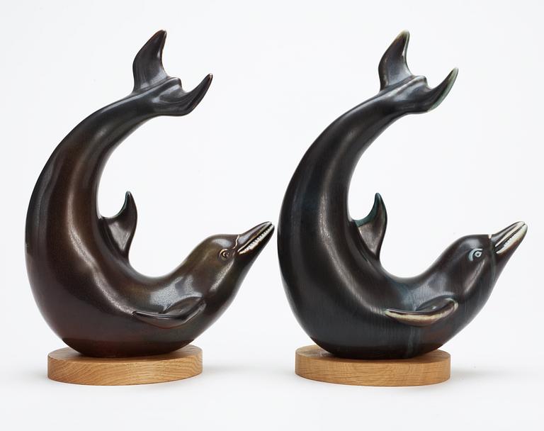 Two Gunnar Nylund stoneware figures of dolphins, Rörstrand.