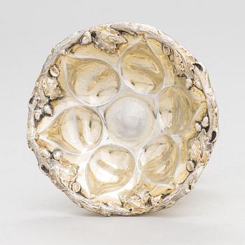 A parcel-gilt salt cellar, maker's mark Carl Adolf Seipel, assay master mark of Aleksandr Mitin, S:t Petersburg 1859.