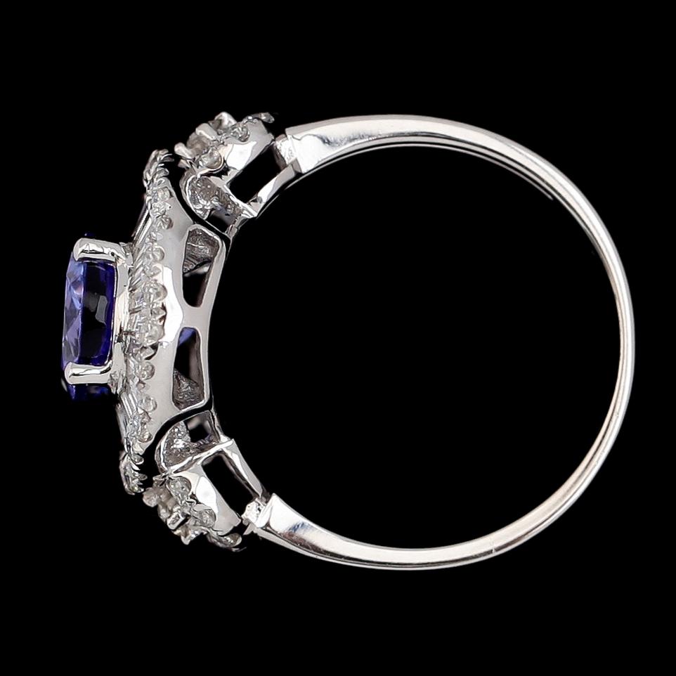 RING, 18K vitguld, diamanter tot ca 1.00 ct, tanzanit ca 2.65 ct.