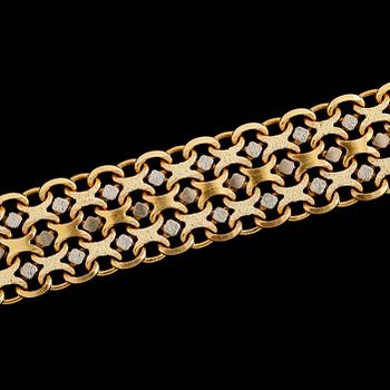 ARMBAND, 18K rött och vitt guld. Vikt 56 ca g.