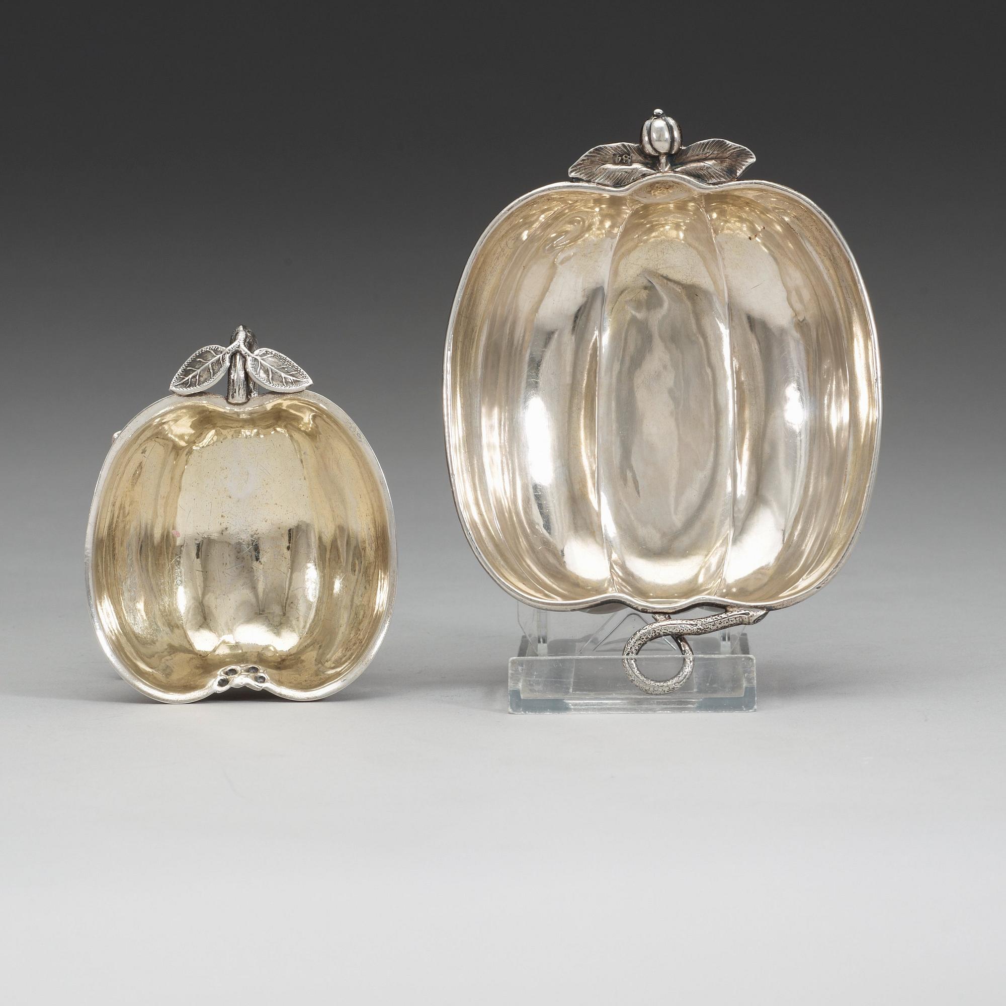 Two Russian mid 19th century parcel-gilt dishes, marked Carl Ekqvist, S:t Petersburg and unidentified maker, Moscow.