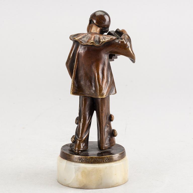 An early 20th century bronze with alabaster base by Francizek Jozef Kucharzyk.