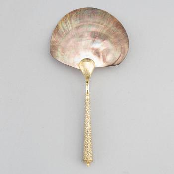 A silver and mother of pearl serving spoon, P. Hertz, Copenhagen, Denmark, 1885.