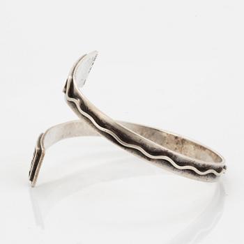 A silver bangle by Samuelssons Silversmedja.