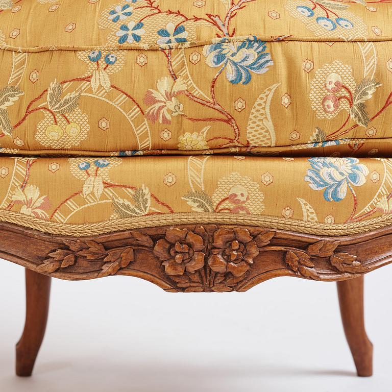 A pair of Louis XV bergeres by Georges Jacob (master in Paris 1765-1814(.