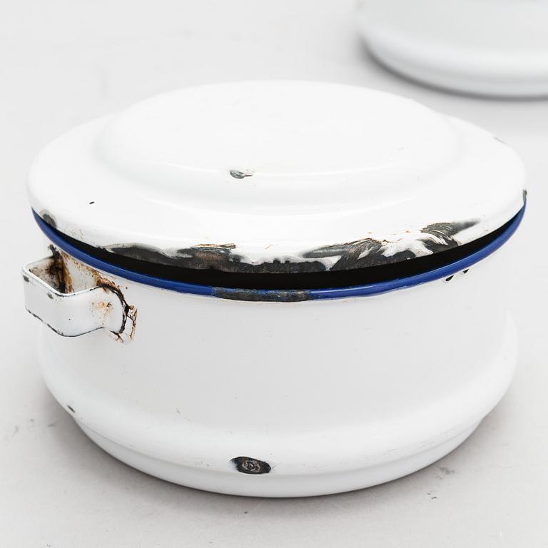 A set of 7 enamelled metal serving dishes. Kockums emaljverk and Finel.