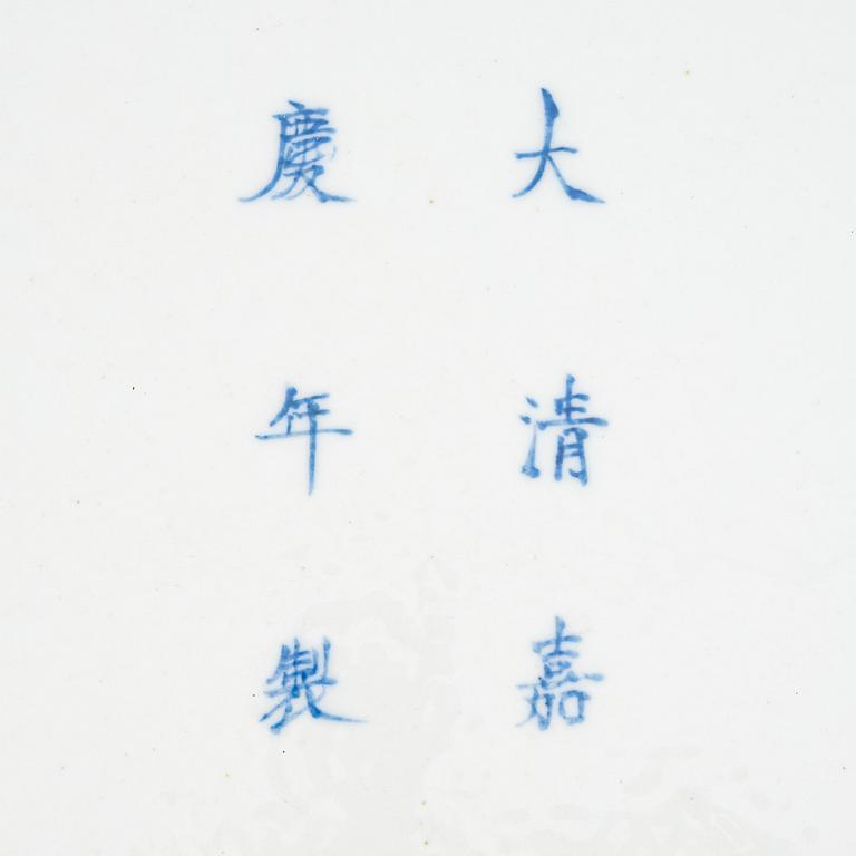 A large Chinese porcelain dish depicting the eight immortals, second half of the 20th century.