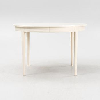 Carl Malmsten, a 'Herrgården' dining table and four 'Ulfåsa' chairs, second half of the 20th Century.