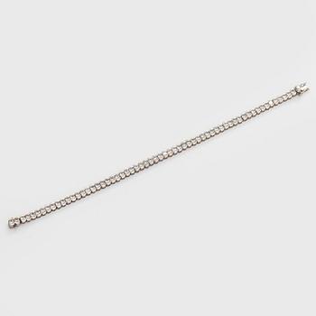 Tennisrannekoru, 18K valkokultaa, briljanttihiottuja timantteja.