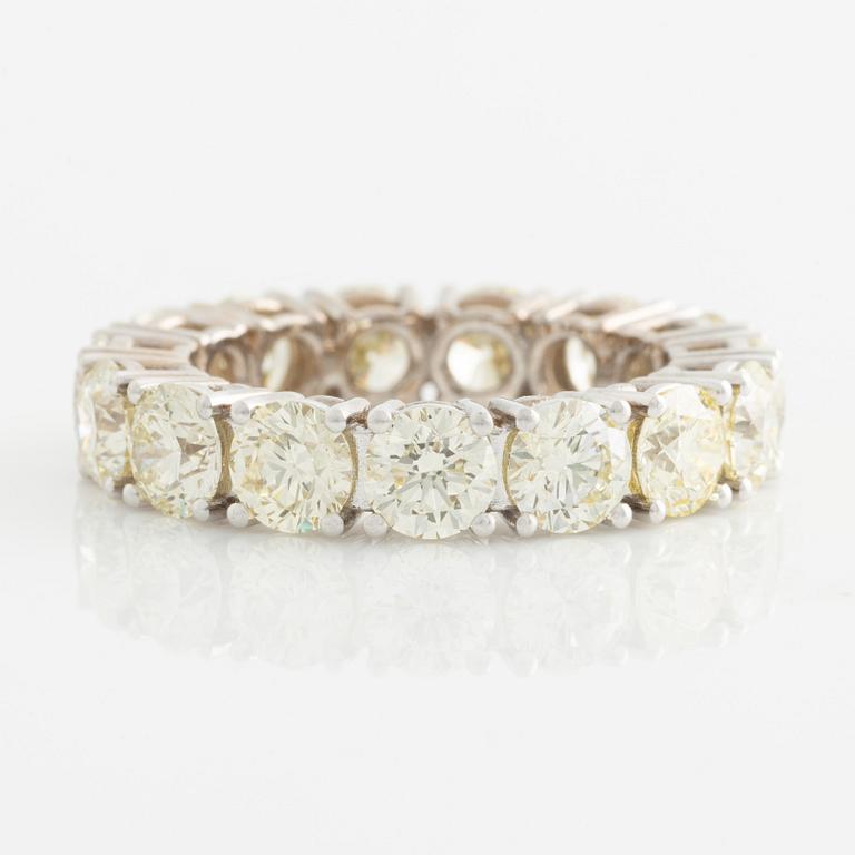 Ring full eternity with yellow brilliant-cut diamonds.