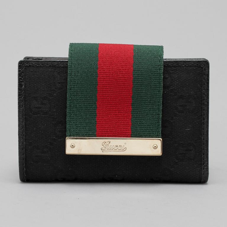 PLÅNBOK, Gucci, "continental wallet", 2000-tal.