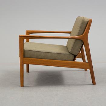 An 'USA 75' easy chair by Folke Ohlsson, Dux.