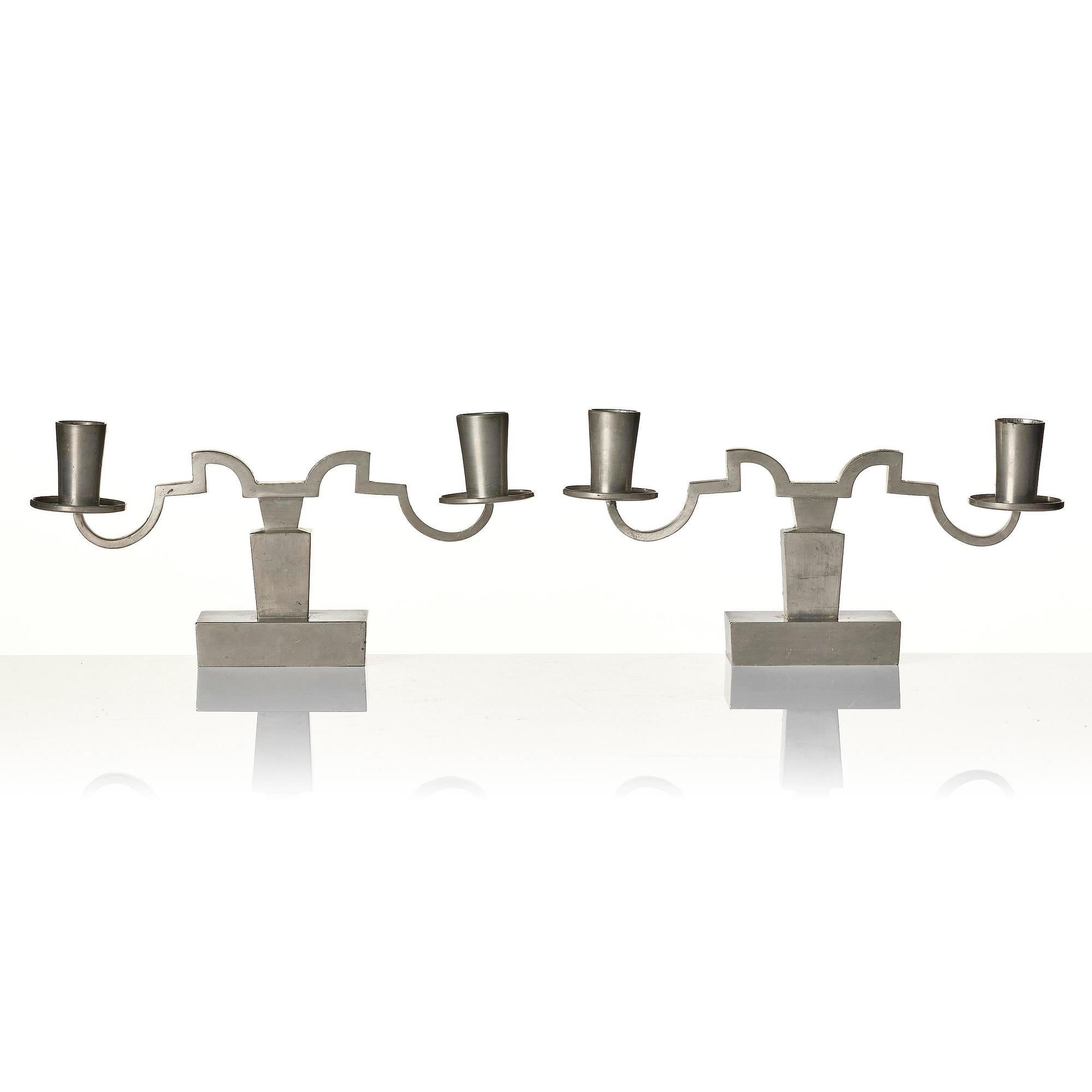 Nils Fougstedt, a pair of pewter candelabra model "A 1047", Firma Svenskt Tenn, Stockholm 1932.