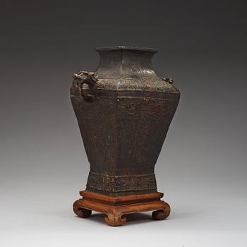 An archaistic bronze beaker vase.