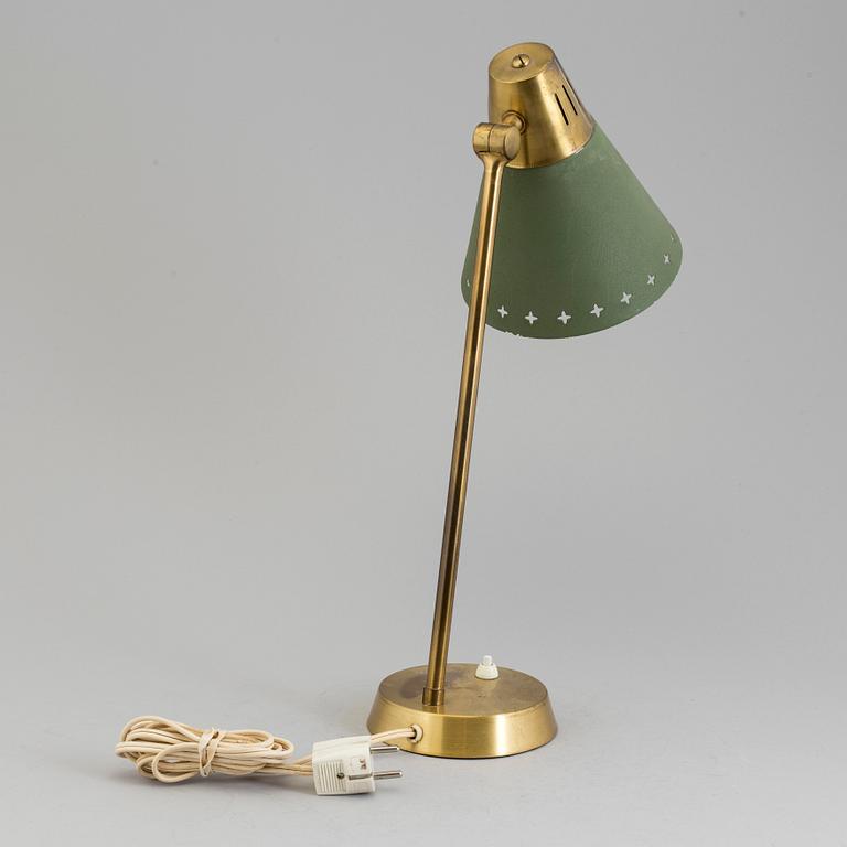 A mid 20th century table lamp by Einar Bäckström.