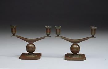 A pair of Sune Bäckström bronze candelabra, Sweden 1920's-1930'.