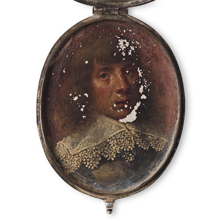 UNKNOWN ARTIST 17TH CENTURY, Portrait of a gentleman in a silvermedallion with german coat of arms.