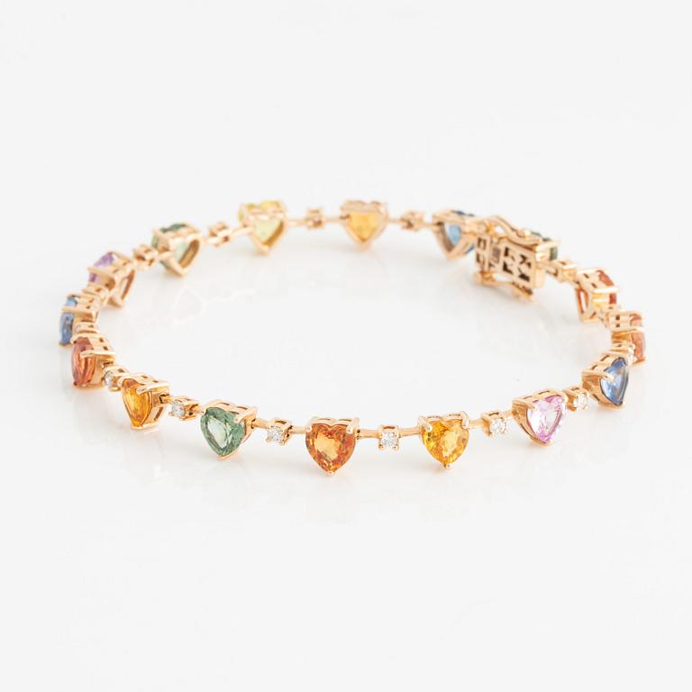 Bracelet with heart-shaped multicolored sapphires and brilliant-cut diamonds.