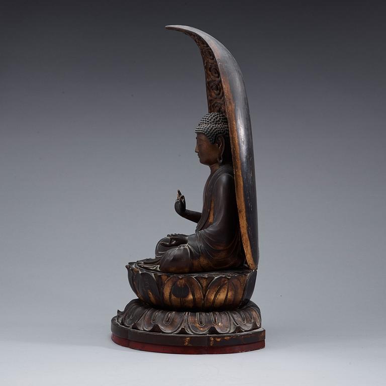 A Japanese wood and lacquer figure of buddha, Meiji (1868-1912).