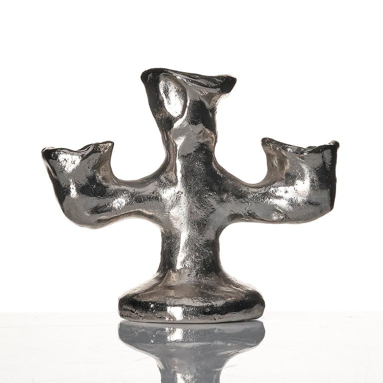 Dan Wolgers, "Källa (Trearmad ljusstake)".