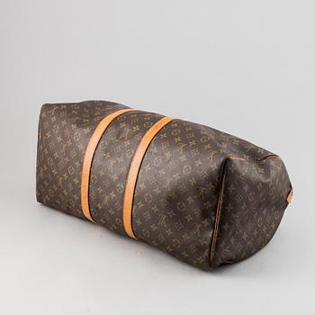 Louis Vuitton, a monogram canvas 'Keepall 55' weekend bag and toilet bag.