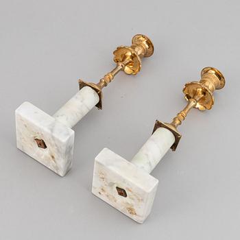 A pair of late gustavian candlesticks, ca 1800.