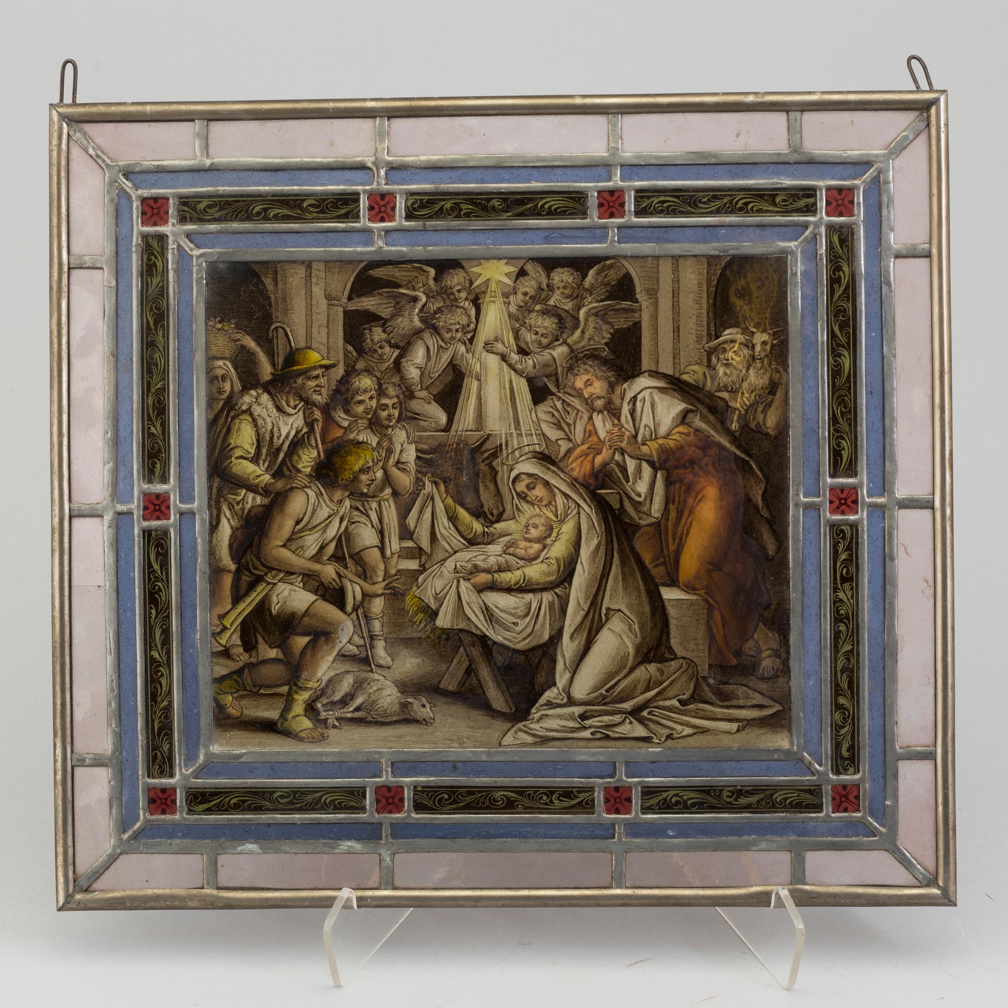 A pair of stained glass windows, circa 1900.