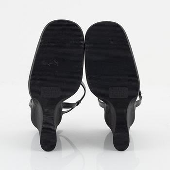 Gucci, a pair of wedge heel shoes, Italian size 36.
