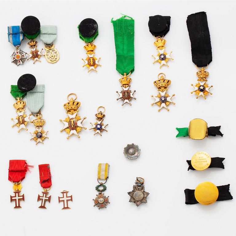 A group of miniature decorations, mostly Swedish.