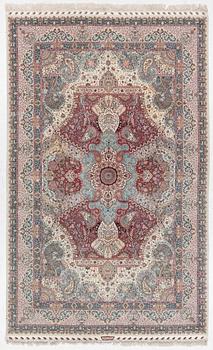 A Tabriz, carpet, 310 x 195 cm. signed.