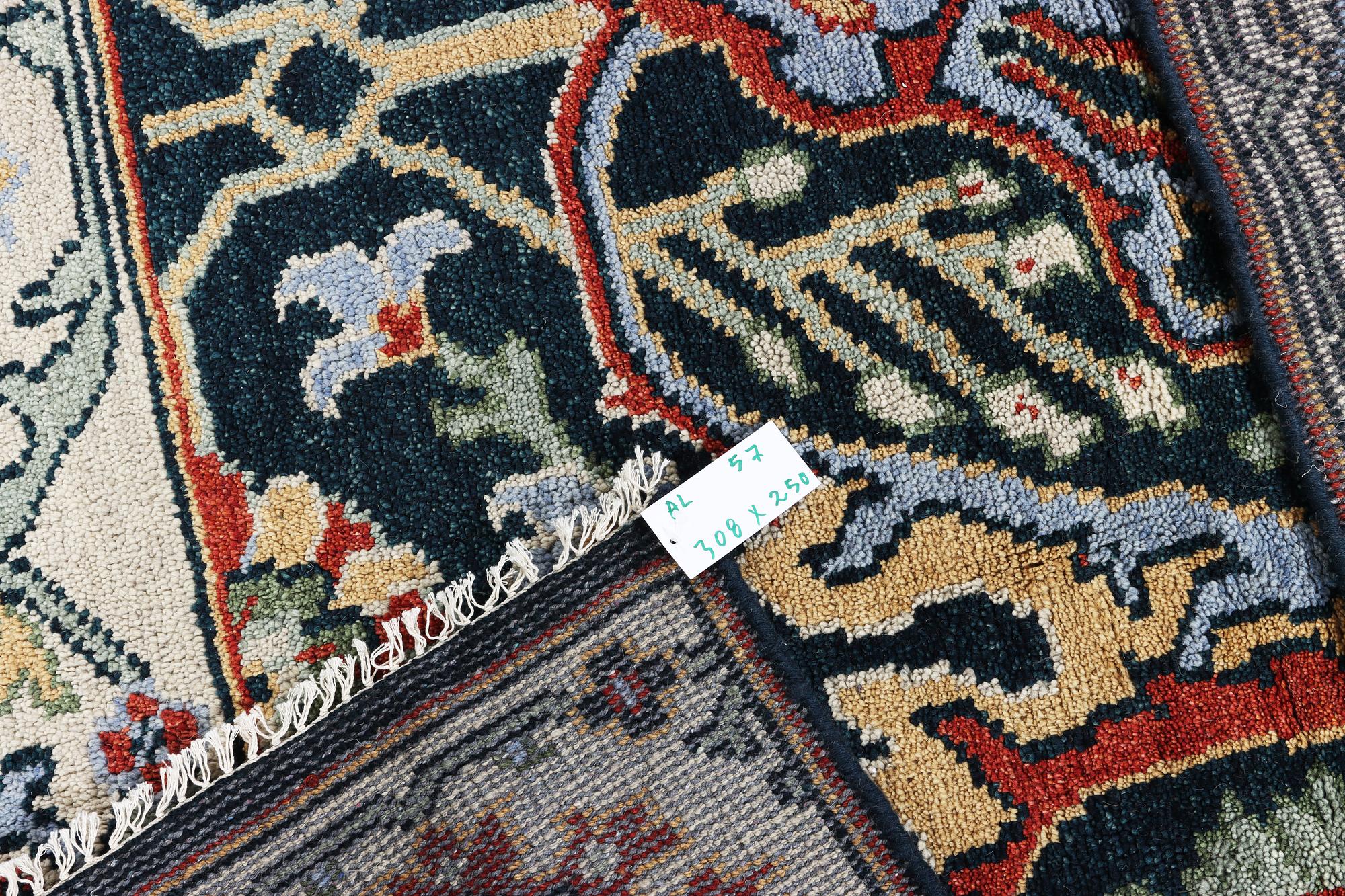 An oriental carpet with so called Mamluk design, a. 308 x 250 cm.