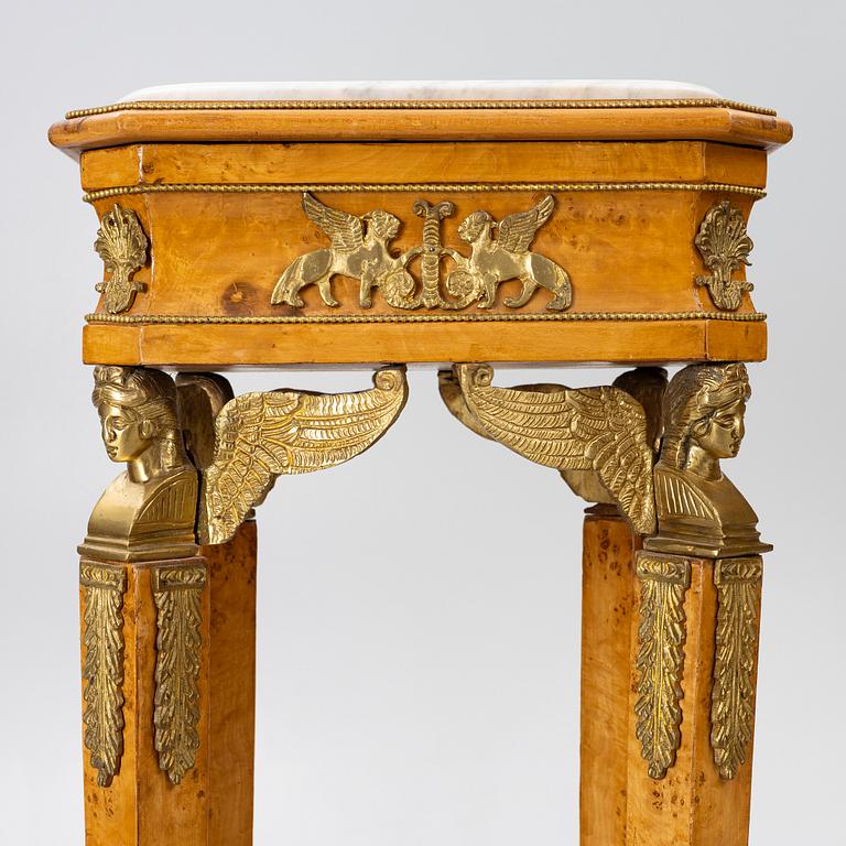 Pedestals, a pair, Empire style, around the year 2000.
