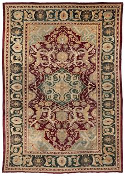 518. An Agra carpet, North India, c. 575 x 404 cm.