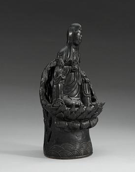 A black figure of Guanyin, Qing dynasty.