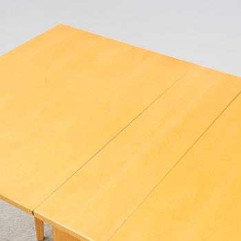 A 'Talavid' birch gate leg table by Carl Malmsten, end of the 20th Century.