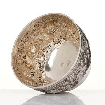 A Chinese Export silver 'dragon' bowl, late 19th century. The base with the monogram D v R beneath a noble coronet.