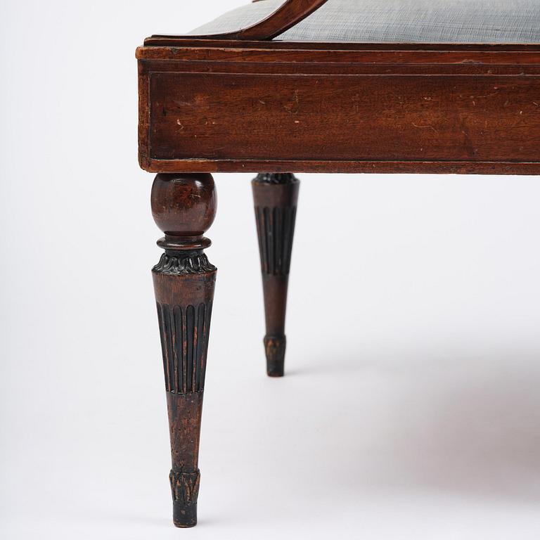 A pair of late Gustavian mahogny armchairs.