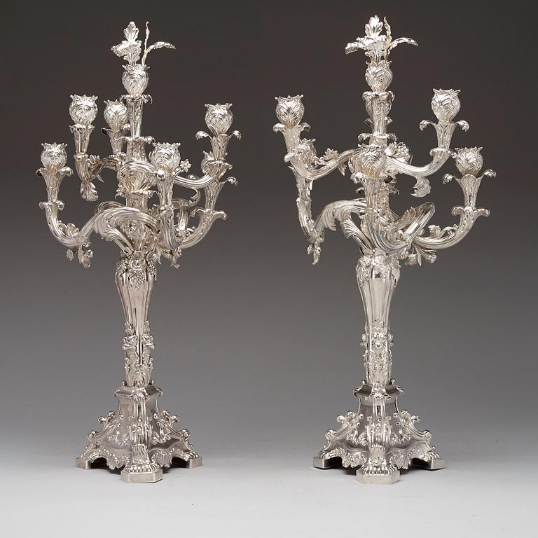 A pair of Swedish 19th century silver candelabras, marks of Gustaf Möllenborg, Stockholm 1845 and 1893.