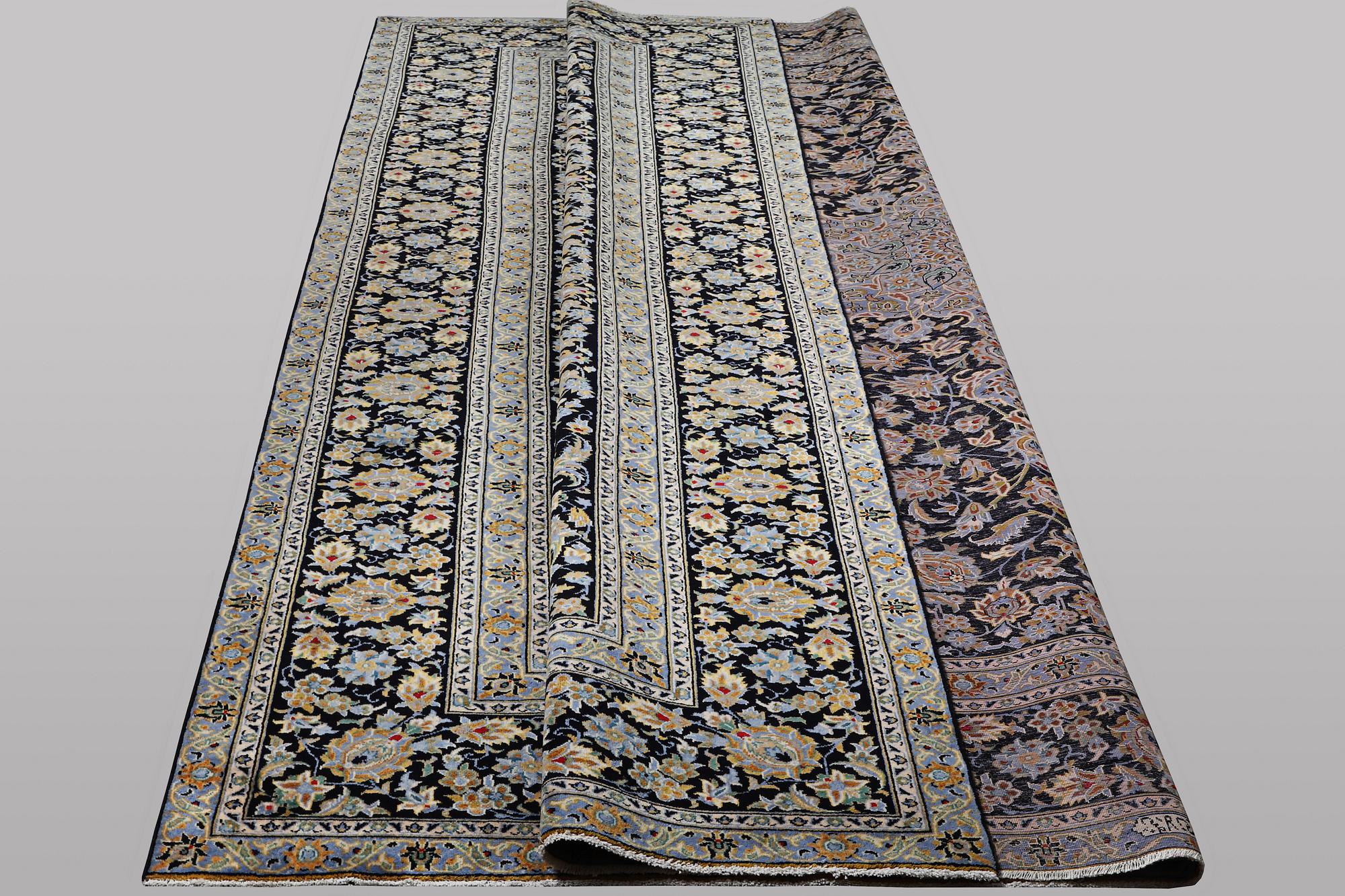 A carpet, Kashan, ca 405 x 295 cm.